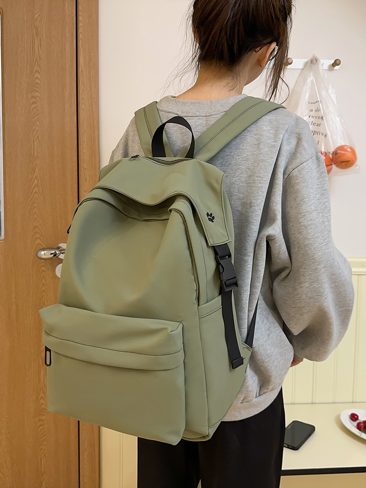 时尚新款学生学生双肩包女日系小众纯色休闲出游旅行高中生背包男