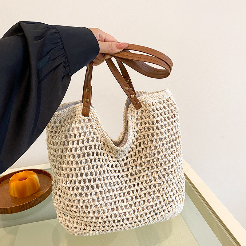 大容量通勤托特包包女春夏2025新款单肩海边度假沙滩包编织草编包