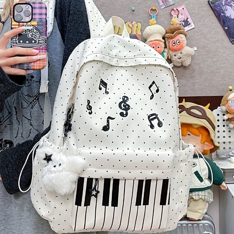 音乐主题双肩包 钢琴键图案 白色波点设计 适合学生日常使用详情图3