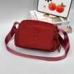 红色尼龙斜挎包 多功能口袋 便携单肩包缩略图 1